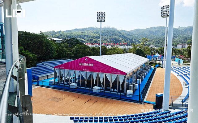 Spectator service tent with seating and facilities at a sports event venue