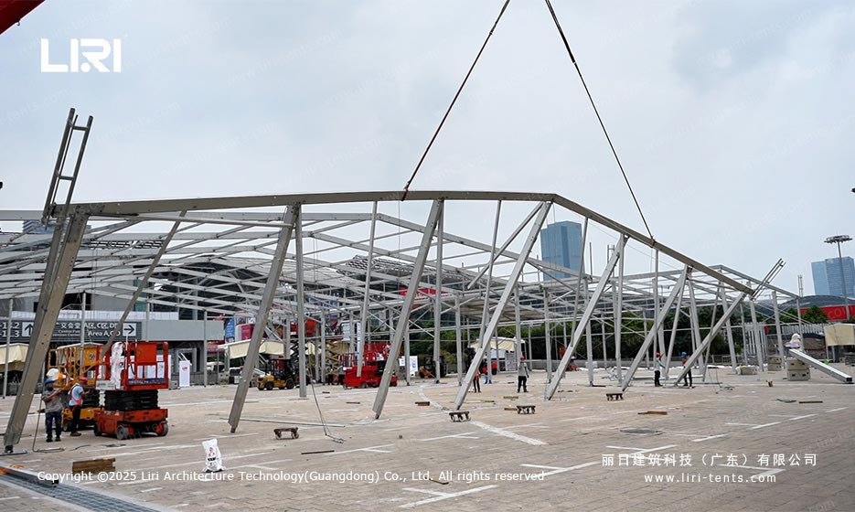 Liri aluminium modular tent framework being lifted into place at the Canton Fair