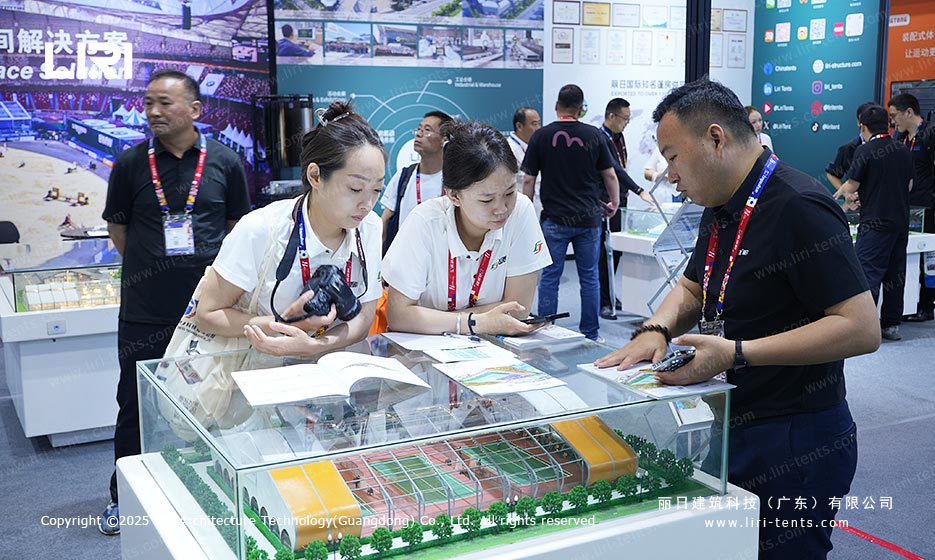 Liri Tent prefabricated sports venue model discussion with visitors
