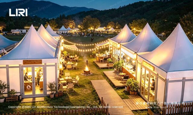 Illuminated modular pagoda tents with outdoor dining at night